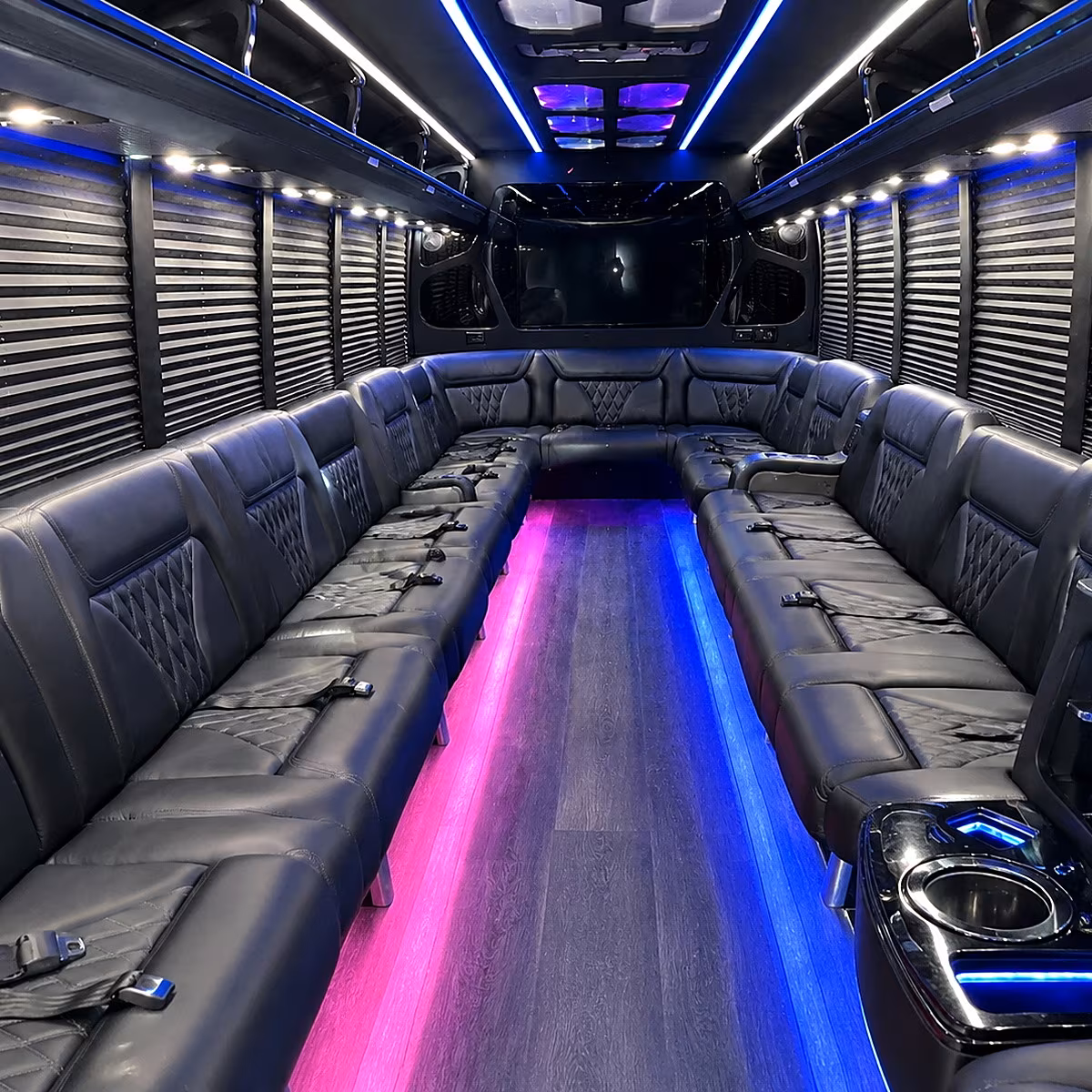 Wedding guests seated inside a party bus serving Wellington